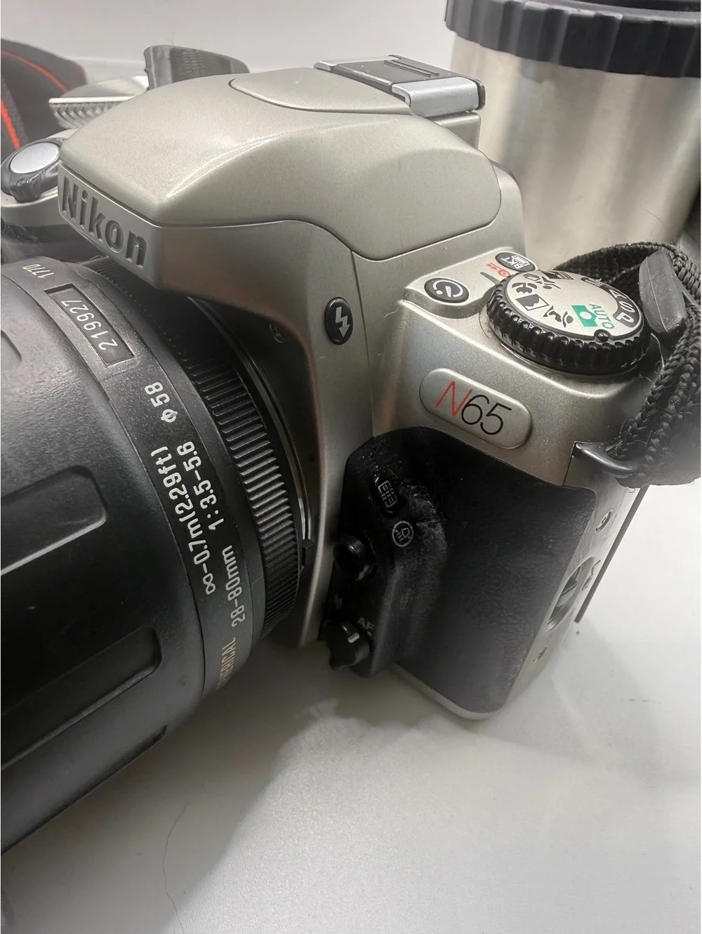 Nikon N65 35-70mm SLR Film Camera with Accessories and Carrying Case